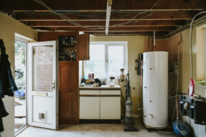photo of a garage with a water heater